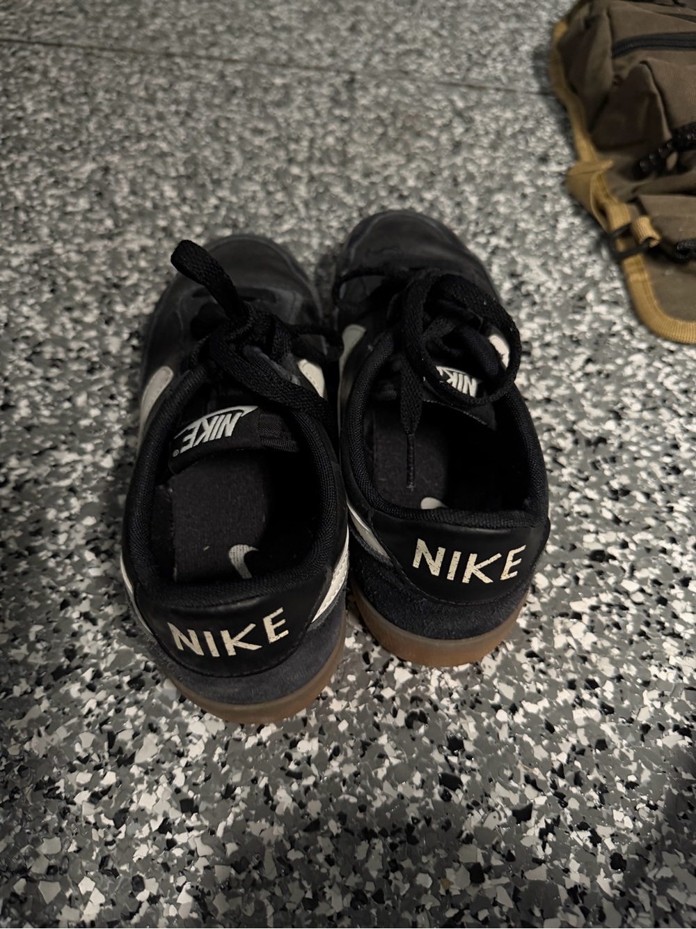 Nike Kids Black Sneakers with White Swoosh and Gum Sole